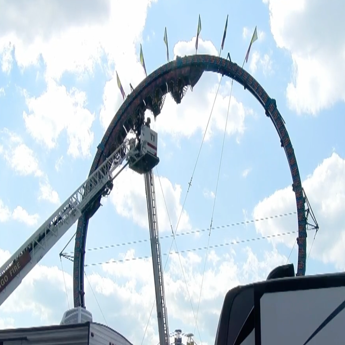 Roller coaster riders stuck upside down after mechanical failure